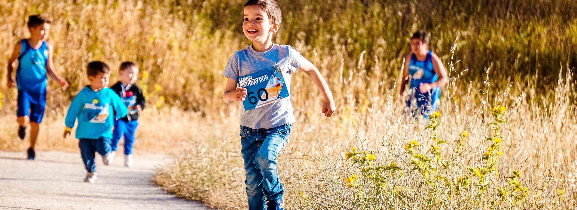 Kids running through field