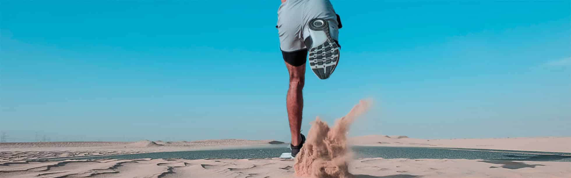 Man running through sand